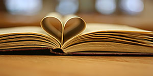 Book pages folded to form a heart